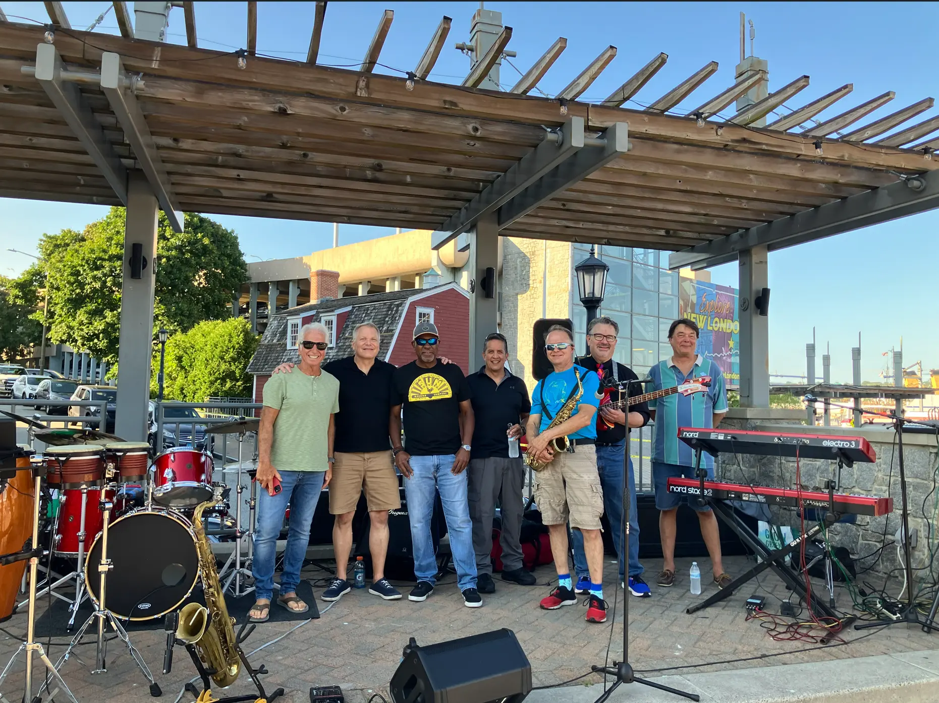 Andre and the band under the bandstand at a live show